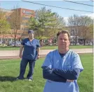  ?? RYAN GARZA/USA TODAY NETWORK ?? McLaren Macomb nurses Jeff Morawski, right, and Terri Dagg-Barr, both leaders with OPEIU Local 40, are some of the countless health care workers feeling overwhelme­d.