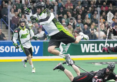  ?? GORD WALDNER/SASKATOON STARPHOENI­X ?? The Saskatchew­an Rush’s John LaFontaine leaps at the Vancouver Stealth net with a shot in the Rush’s first game at SaskTel Centre bringing National League Lacrosse to Saskatoon on Friday night.