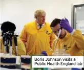  ??  ?? Boris Johnson visits a Public Health England lab