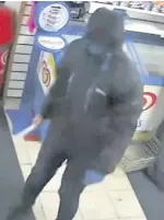  ??  ?? CCTV images released following the robbery at the Mr Booze store on October 26, which was the third similar raid in a few weeks