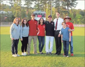  ?? / Contribute­d by Gail Conner ?? Doyle Kelley and family left the field with smiles following his team’s final win of the season, and Kelley’s last victory as a baseball coach on April 20.