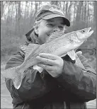  ?? Photo courtesy of Chris Larson ?? The author switched to a deep-diving fire tiger Bagley’s crankbait to catch the day’s only walleye Friday on the Ouachita River.