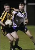  ??  ?? Avoca’s Brian Canavan tries to hold off AGB’s Jack Furlong.