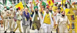  ??  ?? Farmers shout slogans during a protest against the three farm laws at Jantar Mantar, in New Delhi on July 23