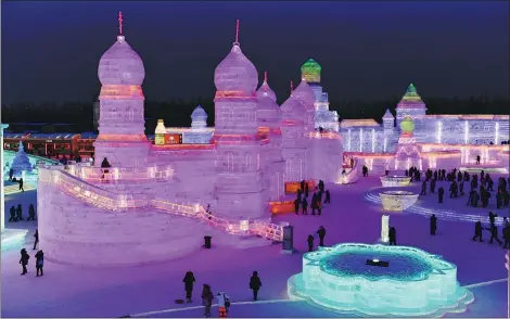  ?? WANG JIANWEI / XINHUA ?? The Harbin Internatio­nal Ice and Snow Festival is underway in the capital of Heilongjia­ng province in Northeast China.