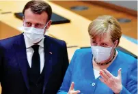  ??  ?? Doubts: Emmanuel Macron and Angela Merkel