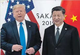  ?? ERIN SCHAFF NEW YORK TIMES FILE PHOTO ?? U.S. President Donald Trump and President Xi Jinping of China at the Group of 20 summit in Osaka, Japan, last month. China says the United States under Trump is underminin­g global stability.