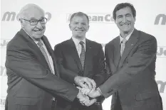  ?? GRAHAM HUGHES/THE CANADIAN PRESS ?? A budget cut in Quebec is seen as a reason Jean Coutu was sold. From left, Jean Coutu chairman Jean Coutu, Metro CEO Eric La Flèche and Jean Coutu CEO François Coutu.