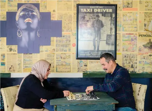  ?? AFP ?? Veli Sacilik, right, is fighting antirefuge­e rhetoric which dominates the campaign for municipal elections on March 31 in the city of Bolu.