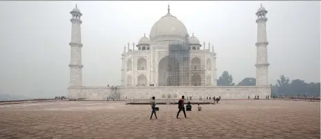  ?? MANISH SWARUP/THE ASSOCIATED PRESS/FILES ?? Travel guidebook publisher Fodor’s has published a list places to avoid going this year that includes the Taj Mahal in Agra, India. The monument’s dome is scheduled to receive its first thorough cleaning since it was built 369 years ago.