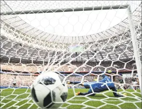  ?? Dan Mullan / Getty Images ?? Hirving Lozano of Mexico scores during his team’s 1-0 win over Germany in the group stage of the World Cup.