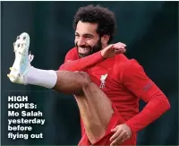  ??  ?? HIGH HOPES: Mo Salah yesterday before flying out