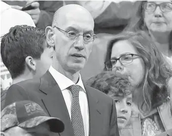  ?? DAVID ZALUBOWSKI/AP ?? The next NBA season likely will have to wait until the start of next year, Commission­er Adam Silver says.