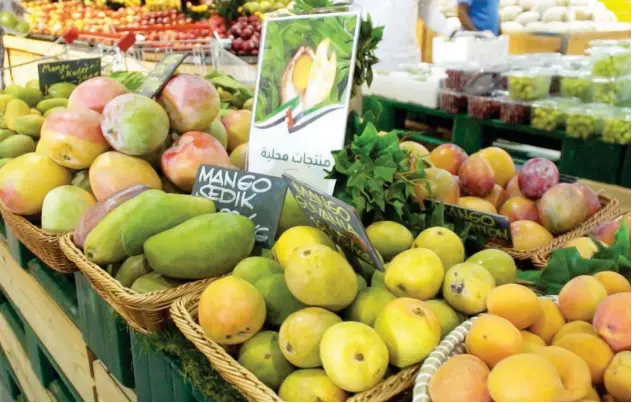  ??  ?? ↑
Vegetable and fruit trading is growing in Dubai due to increased market demand.