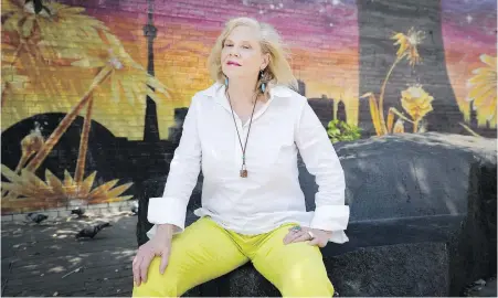  ?? THE CANADIAN PRESS ?? Long-COVID patient Leslie Ann Coles poses for a photograph in Toronto last week. For the filmmaker from Woodbridge, Ont., early symptoms of long COVID were writer’s block and a feeling of apathy.