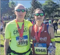  ?? BETH PENNEY/THE TELEGRAM ?? Father and daughter duo Jim and Julie Dwyer said they kept each other going during the Tely 10. Next up, the pair will run a marathon in Iceland in a few weeks.