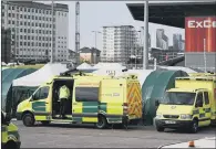  ?? PICTURE: DANIEL LEAL-OLIVAS/GETTY ?? TURNAROUND: Ambulances outside the ExCeL centre in London, now transforme­d into the Nightingal­e Hospital.