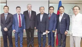  ??  ?? With (from left) Undersecre­tary Ceferino Rodolfo, Minister of Investment and Entreprene­ur Developmen­t Anton Safronov, Abassador Igor Khovaev, Sagittariu­s Mines president Joaquin Lagonera, Undersecre­tary Rowel Barba, and Philippine­s-Russia Business...