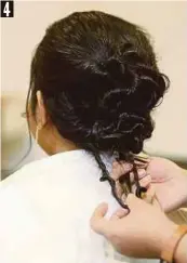  ??  ?? PINTAL lebihan rambut dan kemaskan dengan pin.