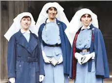  ?? DEPARTMENT OF NATIONAL DEFENCE/LIBRARY AND ARCHIVES CANADA/THE VIMY FOUNDATION ?? They Fought in Colour includes scenes of warmth and joy — such as this photo of nursing sisters Mowat, left, McNichol and Guilbride — but it’s not a sugar-coated treatment of the war.