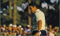  ?? MATT SLOCUM — THE ASSOCIATED PRESS ?? Hideki Matsuyama, of Japan, tips his cap after winning the Masters golf tournament on Sunday in Augusta, Ga. Matsuyama had never won a major championsh­ip before this.