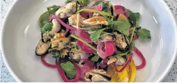  ?? JULIA WEBB ?? Mark Dewolf was inspired by Canada’s Food Island cookbook, which focuses on Prince Edward Island ingredient­s, to create this salad featuring Island mussels and pickled vegetables.