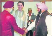  ?? ANI ?? Capt Amarinder Singh greets Canadian defence minister Harjit Sajjan as Justin Trudeau looks on at a hotel in Amritsar.