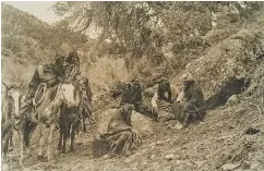  ??  ?? STORIES OF THEIR OWN
White Mountain Apaches gather for storytelli­ng in 1904. The group is one of five related Western Apache bands whose hunter-gatherer ancestors are thought to have migrated to the region that is now Arizona from Yukon or Alaska.