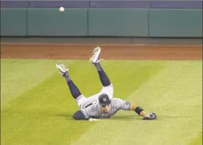  ?? Alex Brandon / Associated Press ?? Yankees right fielder Aaron Judge can’t catch a hit by the Nationals’ Asdrubal Cabrera for a double during the fifth inning of Saturday’s game.