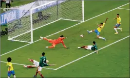  ?? ASSOCIATED PRESS ?? BRAZIL’S NEYMAR (RIGHT) prepares to kick the ball and score during the round of 16 match between Brazil and Mexico at the World Cup in the Samara Arena, in Samara, Russia, Monday.