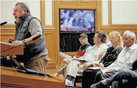  ?? Photos by Michael Macor / The Chronicle ?? At City Hall, cab driver Emil Lawrence addresses the board with his concerns at a meeting of the San Francisco Municipal Transporta­tion Agency. Some drivers complain that the agency is milking the taxi industry to raise money for other transporta­tion...