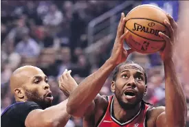  ?? FRANK GUNN/THE CANADIAN PRESS ?? Toronto coach Nick Nurse says forward Kawhi Leonard, right, has made an indelible impression so far this season with his talent and his hustle. The Raptors take a 5-0 mark into their game Friday against the Dallas Mavericks.