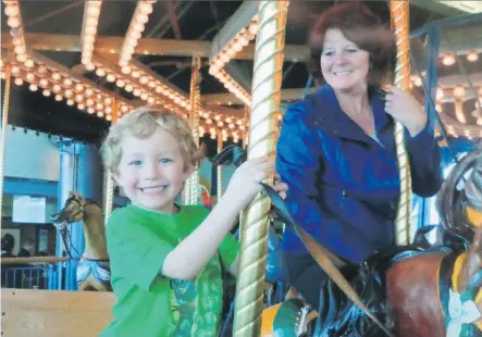  ?? PHOTO COURTESY O’BRIEN FAMILY ?? A Calgary jury has determined that Nathan O’Brien and his grandmothe­r Kathy Liknes, shown here as they ride a merry-go-round together in a family photo, and Alvin Liknes were murdered by Douglas Garland.