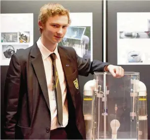  ??  ?? Stockport Grammar pupil Matthew Arden with his winning invention