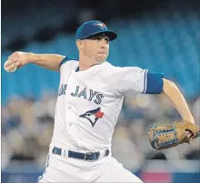  ?? FRED THORNHILL THE CANADIAN PRESS ?? Toronto Blue Jays starting pitcher Aaron Sanchez throws during the first inning of Friday’s American League MLB baseball game against the New York Yankees in Toronto.