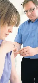  ??  ?? Protected But under half of NHS have had flu jab