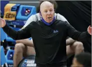  ?? MARK HUMPHREY — THE ASSOCIATED PRESS ?? Mick Cronin has coached UCLA to its first Elite Eight berth in 13years. The Bruins (21-9) face Michigan (23-4) today.