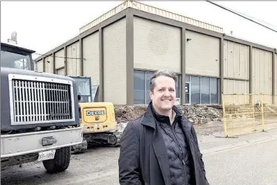  ?? JOE FRIES/OKANAGAN NEWSPAPER GROUP ?? Jeremy Dawn, CEO of SNFLWR Investment Corporatio­n, in front of the company’s first acquisitio­n: a 26,000-square-foot warehouse at 2324 Government St. in Penticton, which is now in the midst of $4.5-million transforma­tion.