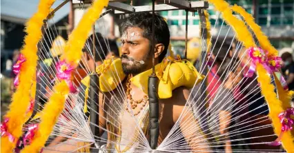  ??  ?? TOP During the Thaipusam festival in Penang, Malaysia, devotees balance elaborate kavadis on their shoulders