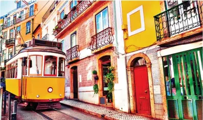  ??  ?? Get on track: Tourists need proof of a negative test to enjoy Portugal’s sights, such as Lisbon
