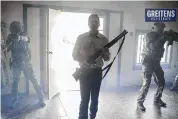  ?? ERIC GREITENS FOR U.S. SENATE VIA AP ?? This image from video shows Eric Greitens, a Republican candidate for U.S. Senate in Missouri, in a campaign video ad that shows him brandishin­g a long gun and declaring that he’s hunting RINOS, or Republican­s In Name Only.