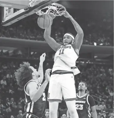  ?? BRYAN WOOLSTON/AP ?? St. John’s center Joel Soriano dunks against Providence on Saturday in New York.