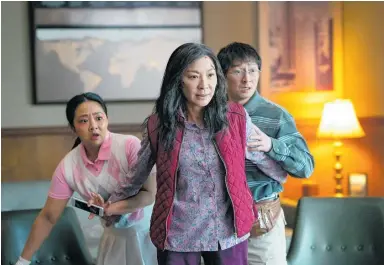  ?? ?? Stephanie Hsu, from left, Michelle Yeoh and Ke Huy Quan in a scene from Everything Everywhere All At Once.