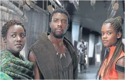  ?? Picture: PA. ?? Black Panther stars, from left, Lupita Nyong’o as Nakia, Chadwick Boseman as T’Challa/Black Panther and Letitia Wright as Shuri.
