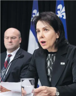  ?? JACQUES BOISSINOT/THE CANADIAN PRESS ?? Quebec’s Ombudsman Raymonde Saint-Germain speaks at a news conference Thursday at the legislatur­e. She said Nunavik inmates are fed on the floor of their overcrowde­d cells.