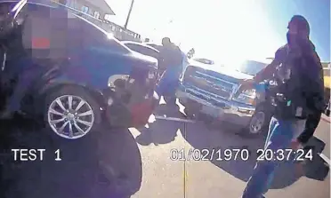  ?? SOURCE: ALBUQUERQU­E POLICE DEPARTMENT ?? An image taken from lapel footage shows APD undercover officer Jacob Grant being shot by Lt. Greg Brachle.