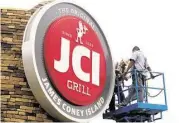  ?? J. Patric Schneider / For the Chronicle ?? JCI Grill, James Coney Island, is celebratin­g its anniversar­y this summer with menu specials.