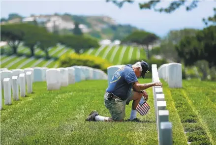  ?? K.C. ALFRED U-T FILE ?? Ceremonies taking place Monday in the county include a service and Day of Remembranc­e at Rosecrans National Cemetery.