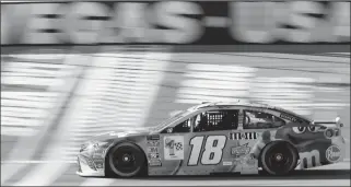  ?? ASSOCIATED PRESS ?? KYLE BUSCH DRIVES DURING QUALIFYING in Las Vegas. for a NASCAR Cup Series auto race Friday at Las Vegas Motor Speedway