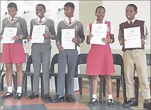  ?? ?? Some of the top performers from John Wesley High School who were among those who received certificat­es of recognitio­n yesterday.